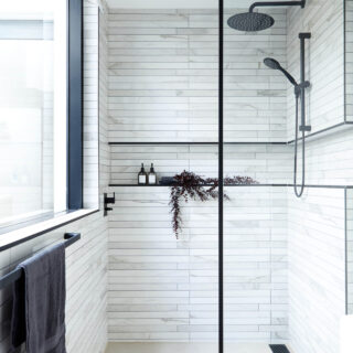 Exquisite Spruce Interiors Designed Bathroom in white and black