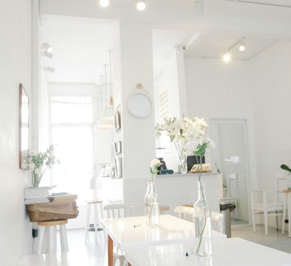 Fresh white interiors through the kitchen and into the casual dining are